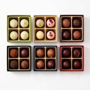 Preview: Verpackung für 4 Pralinen bunt, alle Farben